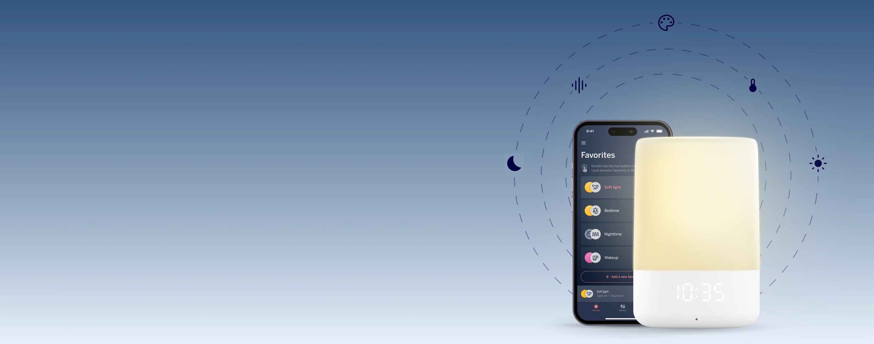 nanit sound and light machine with mobile displaying nanit app