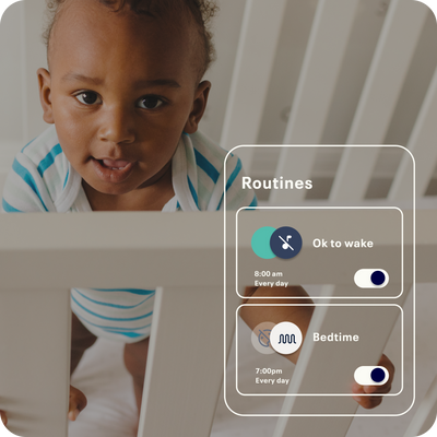 child smiling over crib with app display of routines on nanit app